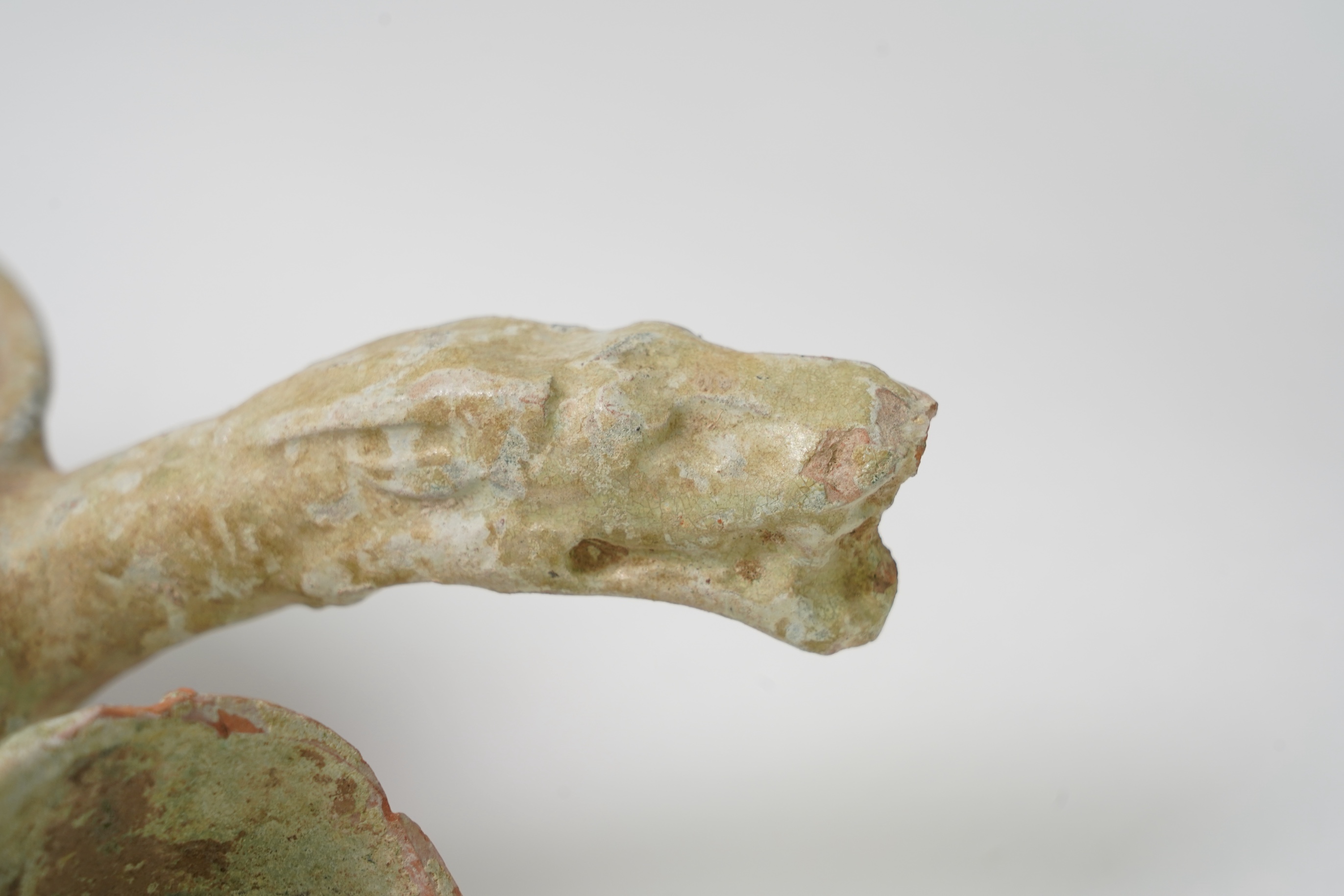 A Chinese earthenware scoop and a similar ladle, Han Dynasty (1st-2nd century A.D.)